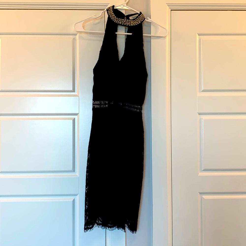 Black with silver/pearl beading to neckline. Worn once! Black Lacey overlay.